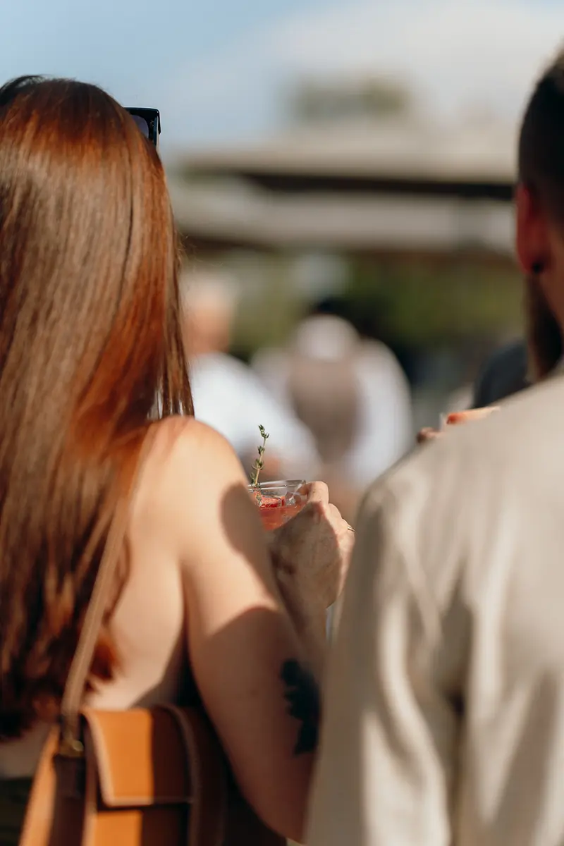 Guests with a cocktail at a corporate event